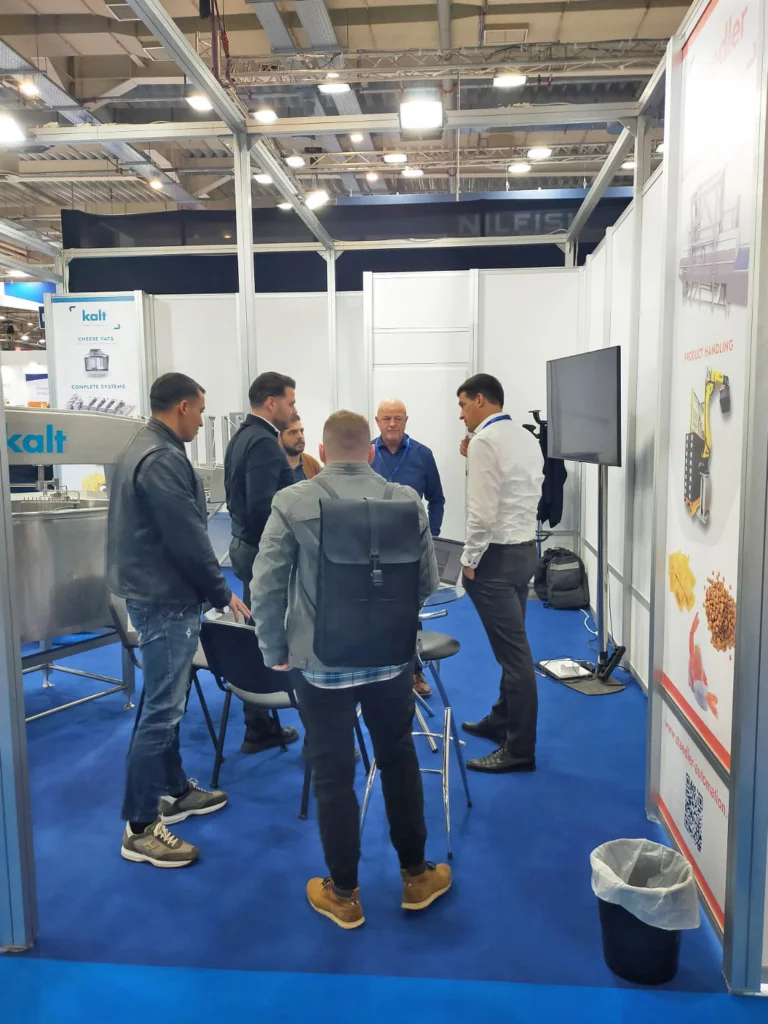 Visitors at Kalt Cheese Technology and Staedler Automation Booth at FoodTech 2025 in Athens, Greece