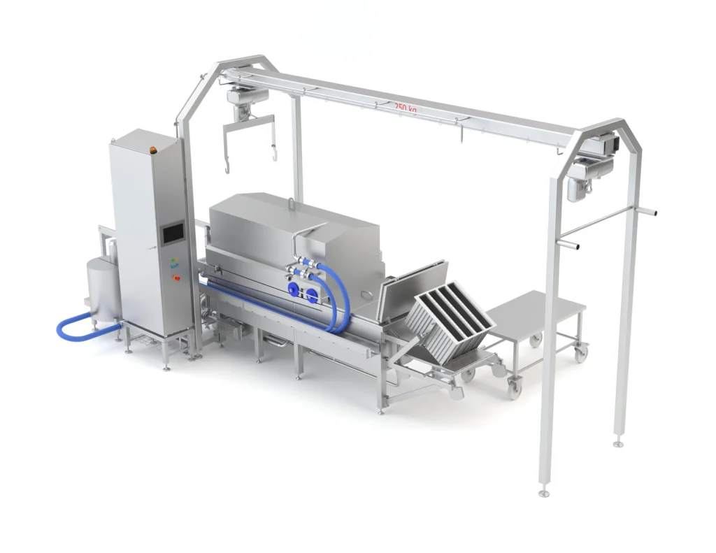 Pilot-scale cheese filling and pressing system with mould cassettes and integrated spice dosing unit for dairy testing applications.